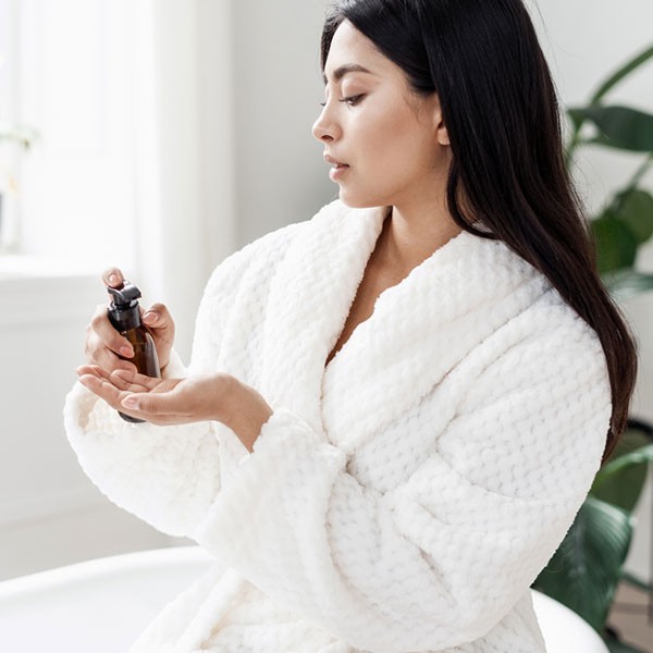 Woman using beauty product