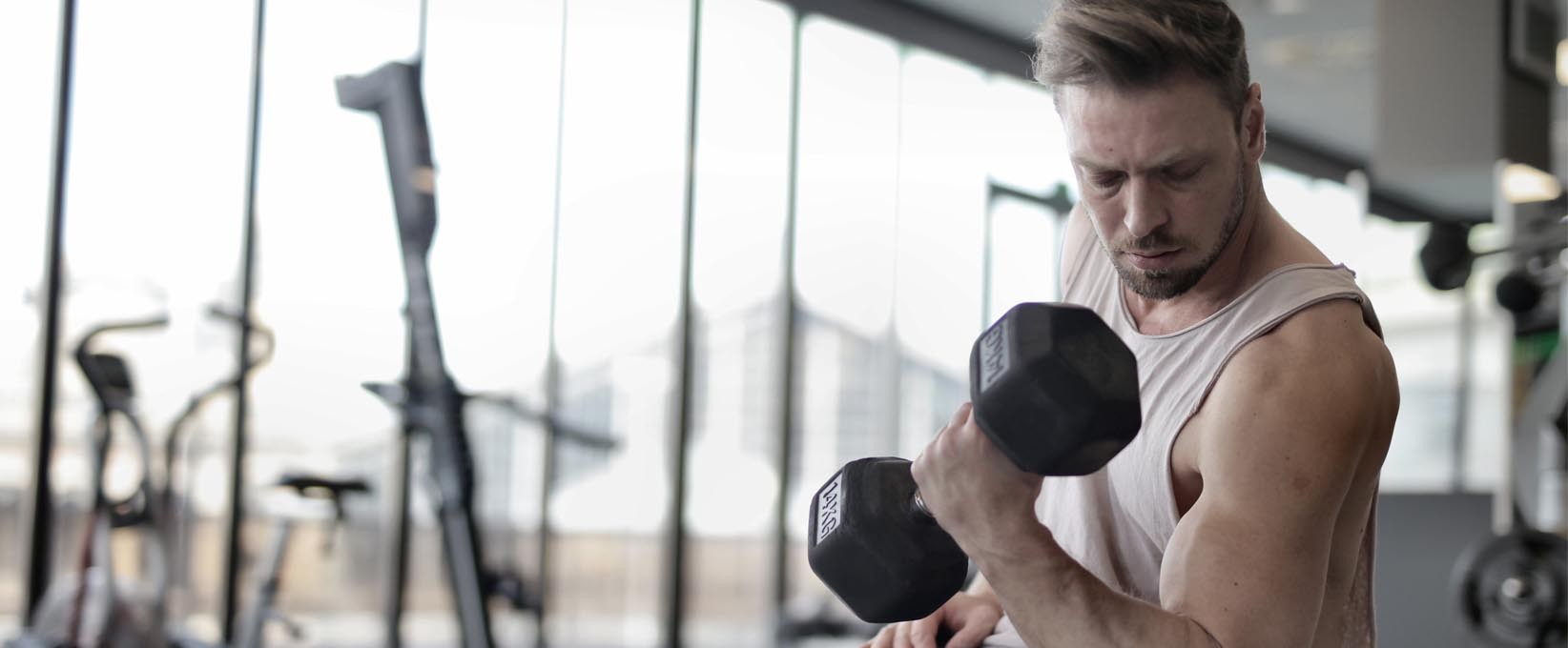 Man holding dumbell